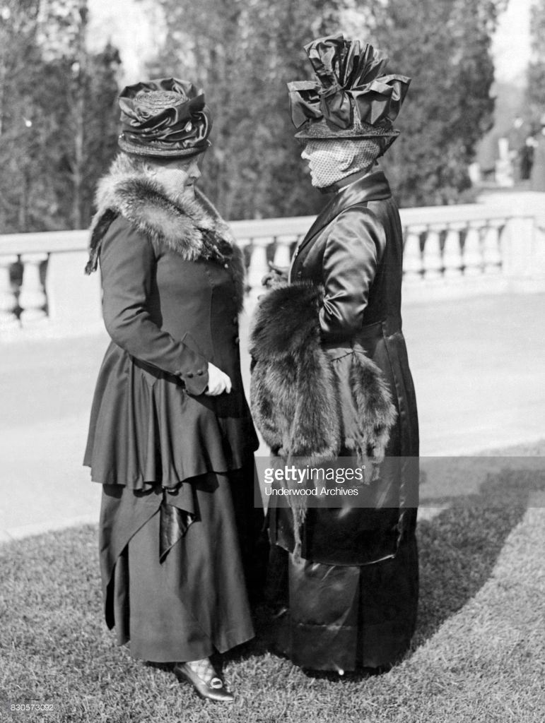 Two society matrons in conversation outdoors New York New York 