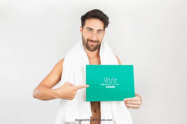 Healthy Man Posing with Towel and Template