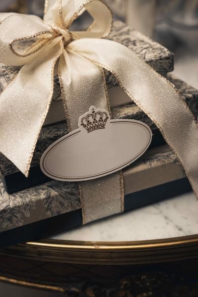 Vertical closeup shot of luxurious boxes with ribbons on a table