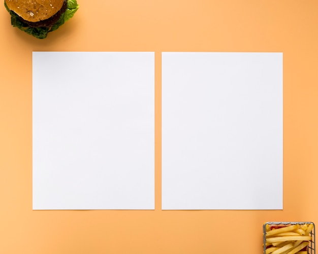 Flat Lay of Blank Menu Papers with Burger and French Fries