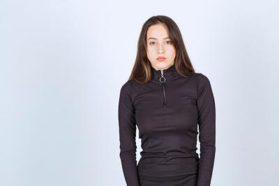 Professional and Neutral Poses of Girl in Black Clothes