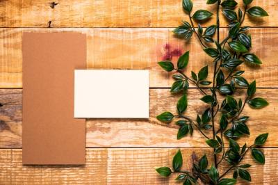 Blank invitation on wooden table