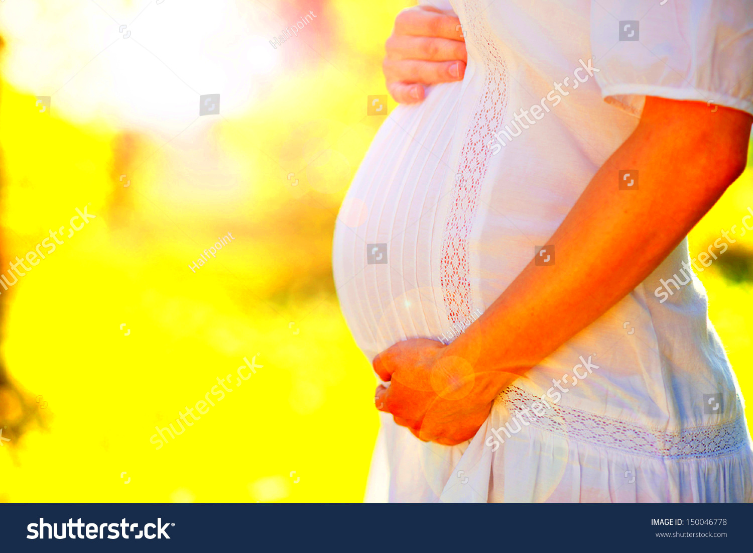 Close Up Of Pregnant Belly In Nature Stock Photo 150046778 Shutterstock