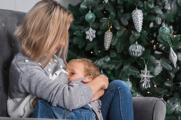 Christmas celebrations with mother and son – Free Stock Photo