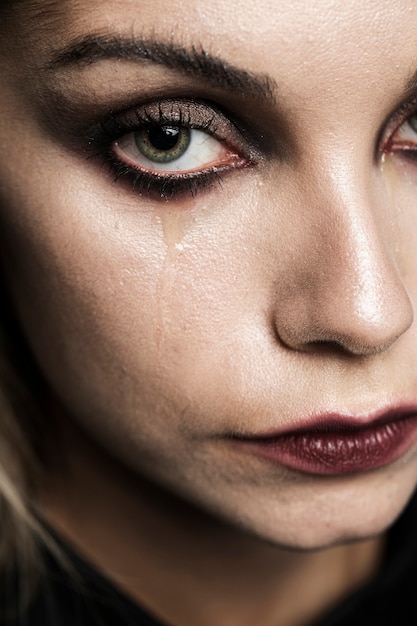 Close-up of woman crying