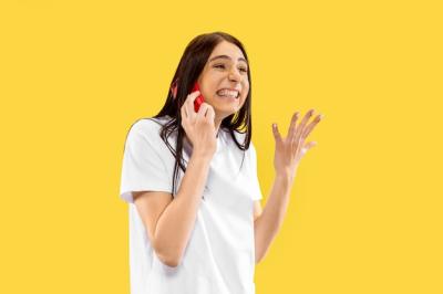 Beautiful Female Half-Length Portrait Isolated on Yellow Space