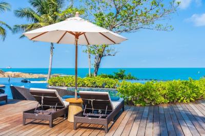 Outdoor Swimming Pool in Hotel Resort with Sea Ocean View