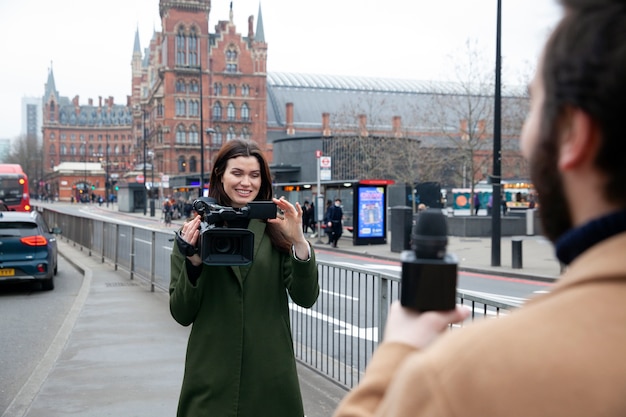 Close Up Smiley Reporter in UK