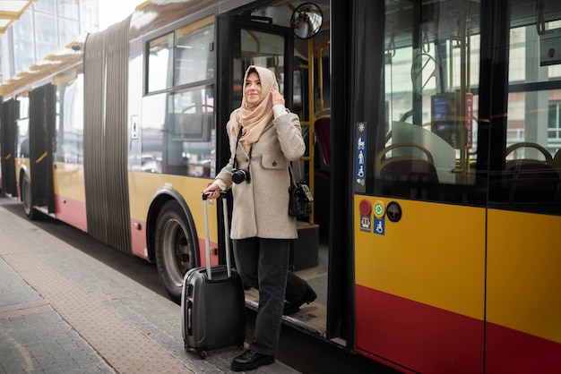 Muslim Person Travelling Through the City – Free Stock Photo Download