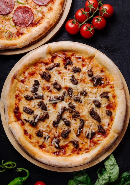 Classic Italian Pizza with Melted Cheese, Black Olives, and Tomato Sauce