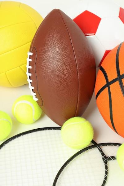 Balls for various sports on a light background