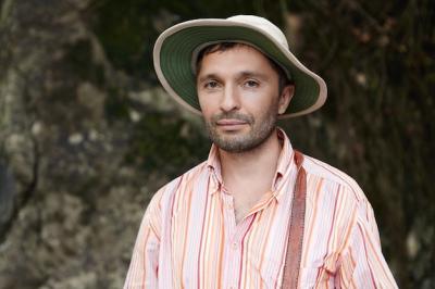 Attractive Scientist with Stubble Conducting Field Study Outdoors