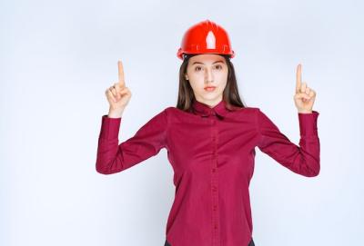 Female Architect in Red Hard Helmet Posing Over White Wall – Free Download