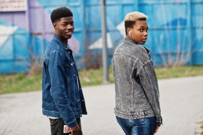 Young Millennial African Couple in City – Happy Black Friends in Jeans Jackets Generation Z Concept