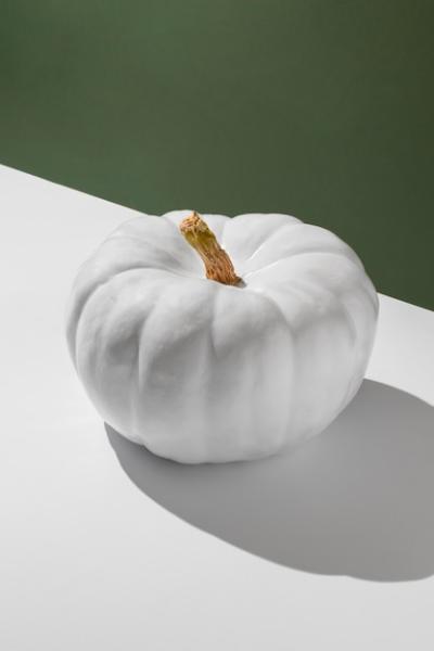 White Pumpkin with Green Background