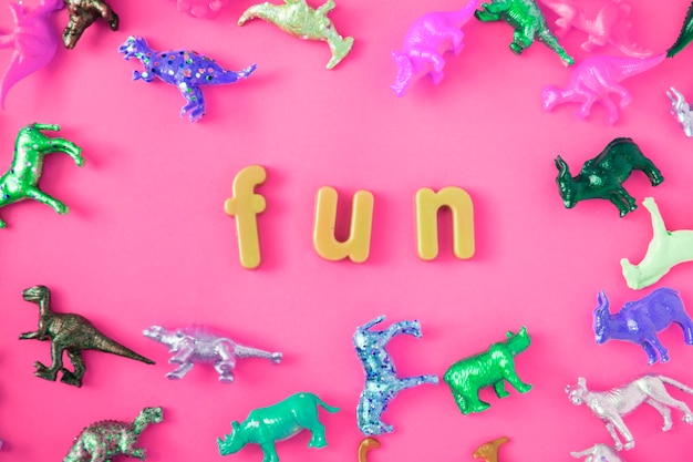 Animal Toy Figures Background with Fun Word – Free Download