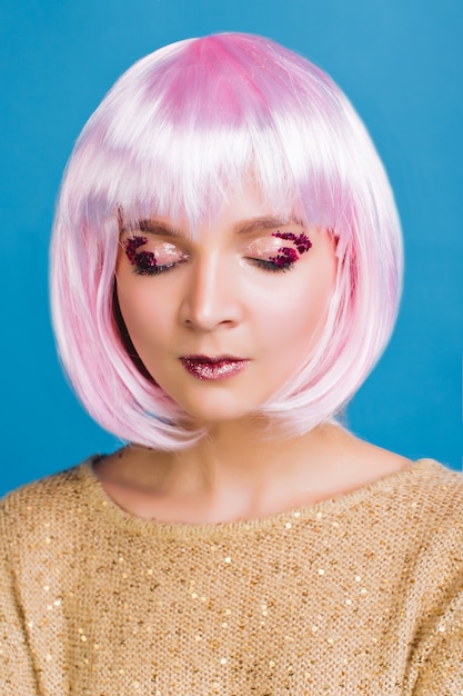 Charming Young Woman with Cut Pink Hair and Closed Eyes