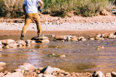 Tourist in desert landscape – Free Stock Photo for Download