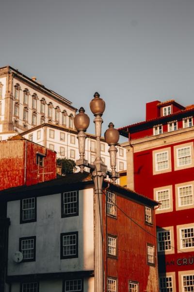 Low angle shot of beautiful red high-rise buildings in Porto, Portugal