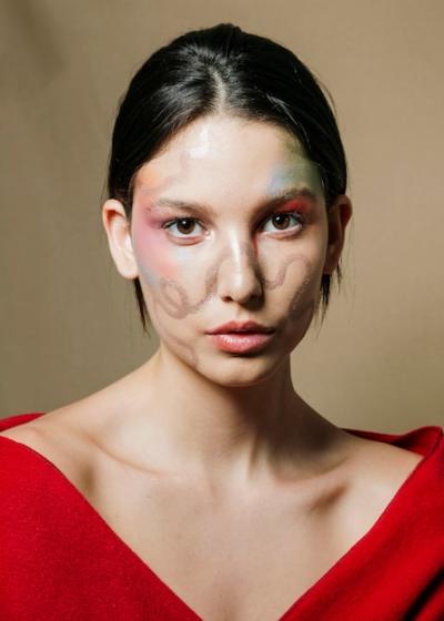 Front View of Elegant Woman with Painted Face