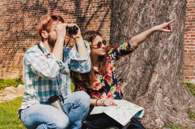 Explore the World with Guy Using Binoculars – Free Stock Photo Download