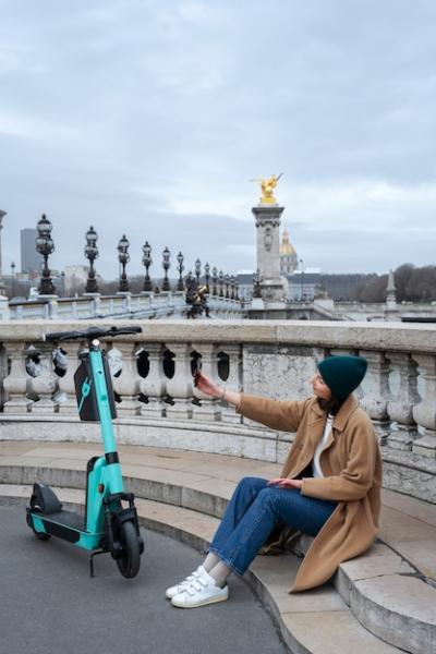 Person using electric scooter in the city