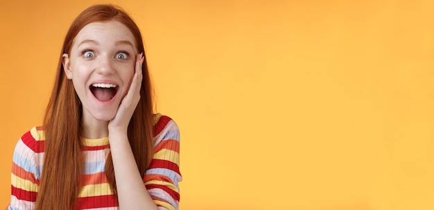 Happy Smiling Redhead Woman Screaming Astonished