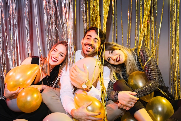 Friends with balloons at 2018 celebrations