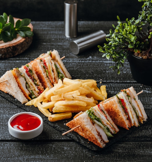 Club Sandwich with French Fries on the Table Free Download