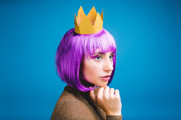 Fashionable Young Woman in Golden Crown with Purple Hair