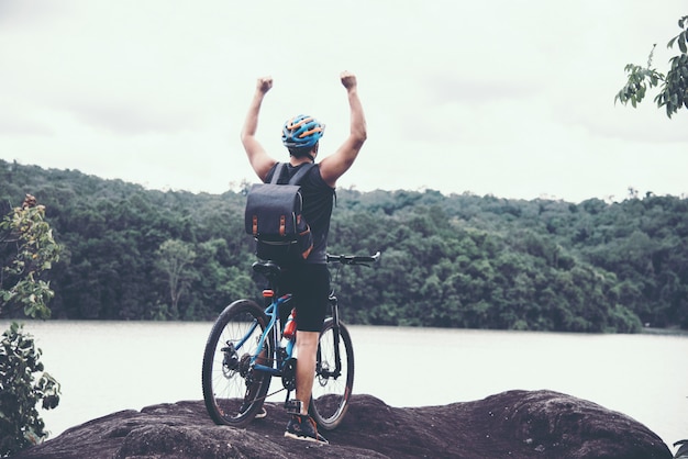 Cyclist On Sunny Day.Bike Adventure Travel Photo