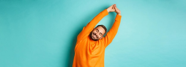 Handsome Young Man Stretching Hands and Smiling Stock Photo – Free Download