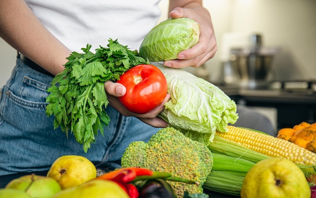 Female Hands Holding Vegetables: Kitchen Food Preparation Concept