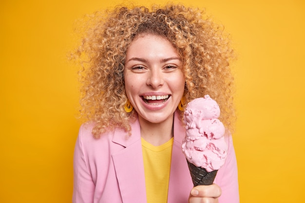 Portrait of a Woman Holding Ice Cream Cone in Park During Summer