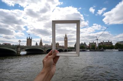 Visiting site behind photo frame