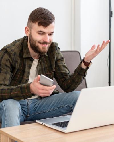 Portrait of adult male enjoying remote work