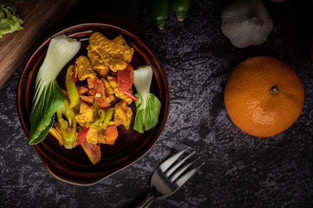 Chicken Stir Fried Chili Along with bell pepper, tomatoes and carrots