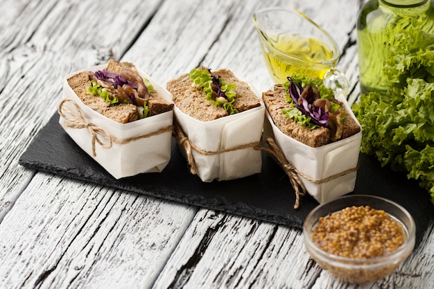 High angle view of sandwiches on slate