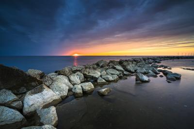 Amazing shot of a natural rocky border on a beautiful sunset