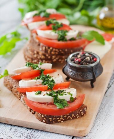 Delicious Sandwiches with Mozzarella, Tomatoes, and Rye Bread