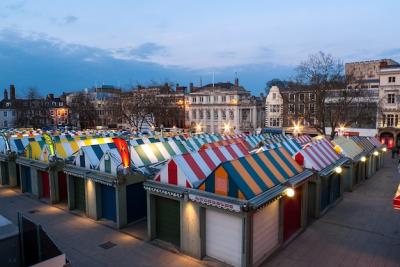 Colorful Norwich Market and Famous Castle at Dusk in Norfolk, England, UK