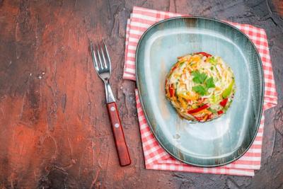 Top View Vegetable Salad Round Shaped Inside Plate on Dark Table