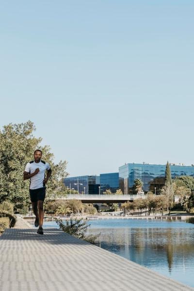 Front View Man Running Outdoors – Free Stock Photo for Download