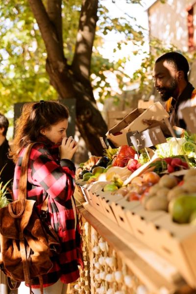 Client Smelling Bio Fruits From Seller