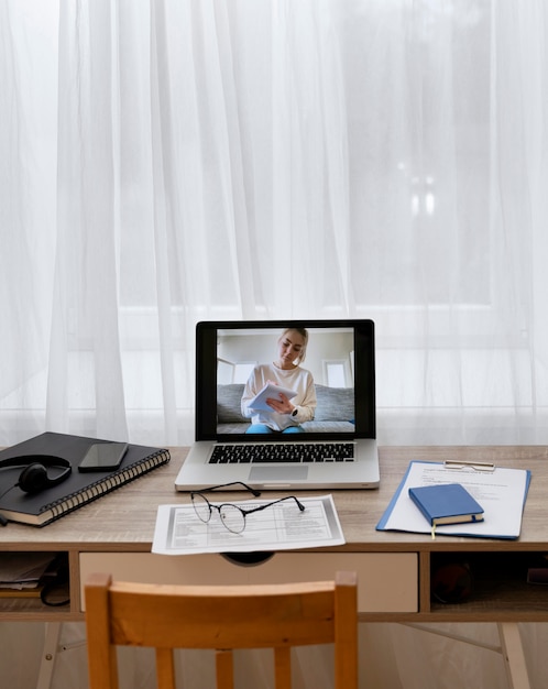 Young female student on a teacher’s laptop