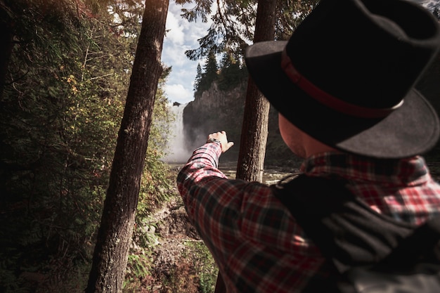 Faceless Man Traveling in Forest