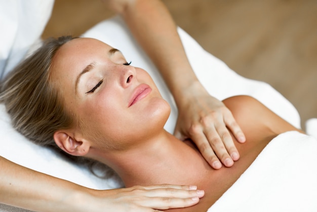 Young Woman Receiving a Head Massage in a Spa Center – Free Stock Photo for Download