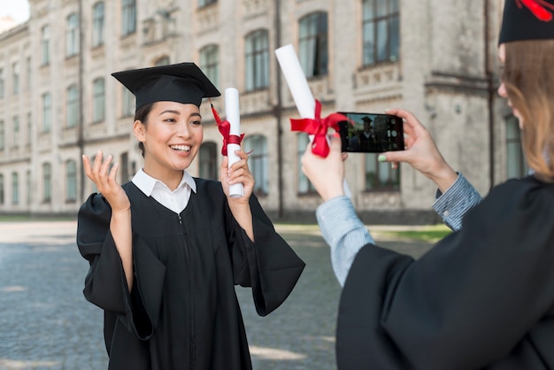 Students Capturing Graduation Moments – Free Stock Photo Download