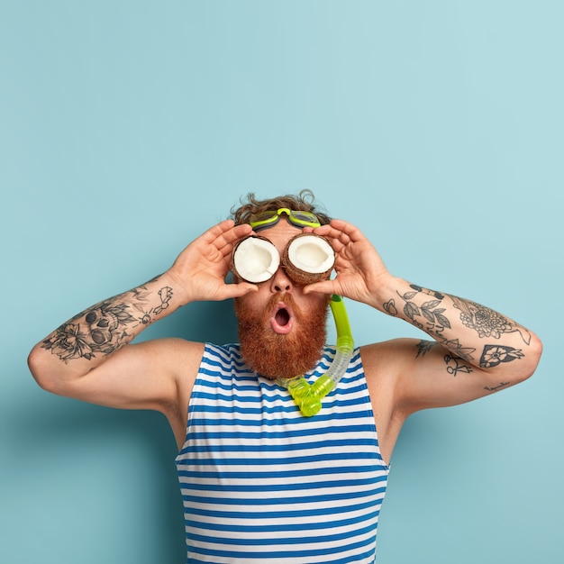 Surprised Guy Covering Eyes with Coconuts and Ginger Beard