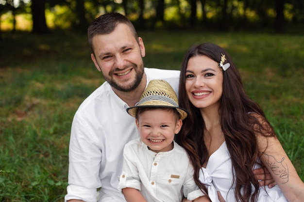 Beautiful Caucasian Family Smiling Happily in Park – Free Stock Photo